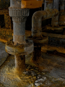 Rusty pipes from untreated water, need acid dosing